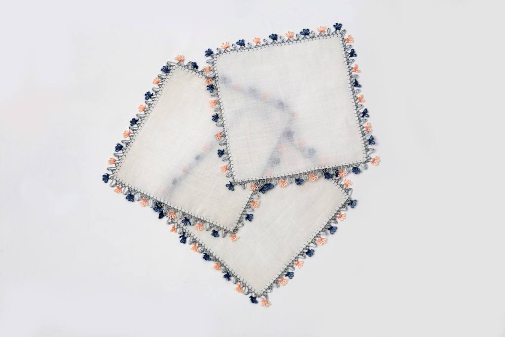 handmade grey lace trimmed cocktail napkin