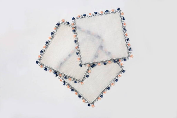 handmade grey lace trimmed cocktail napkin
